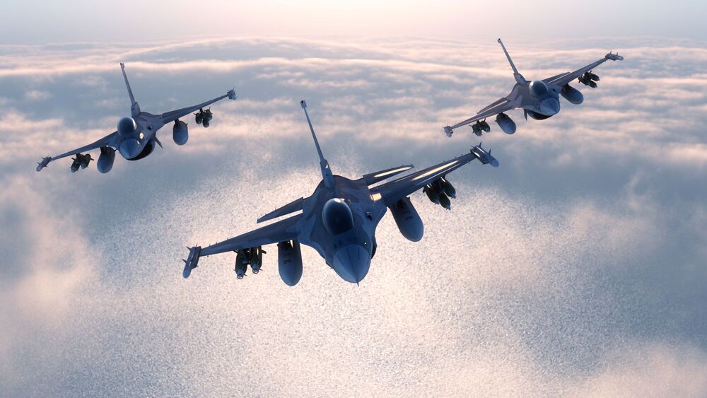 Three airplanes in formation in sky