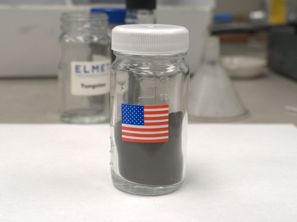 Powder in glass jar with American flag sticker on front