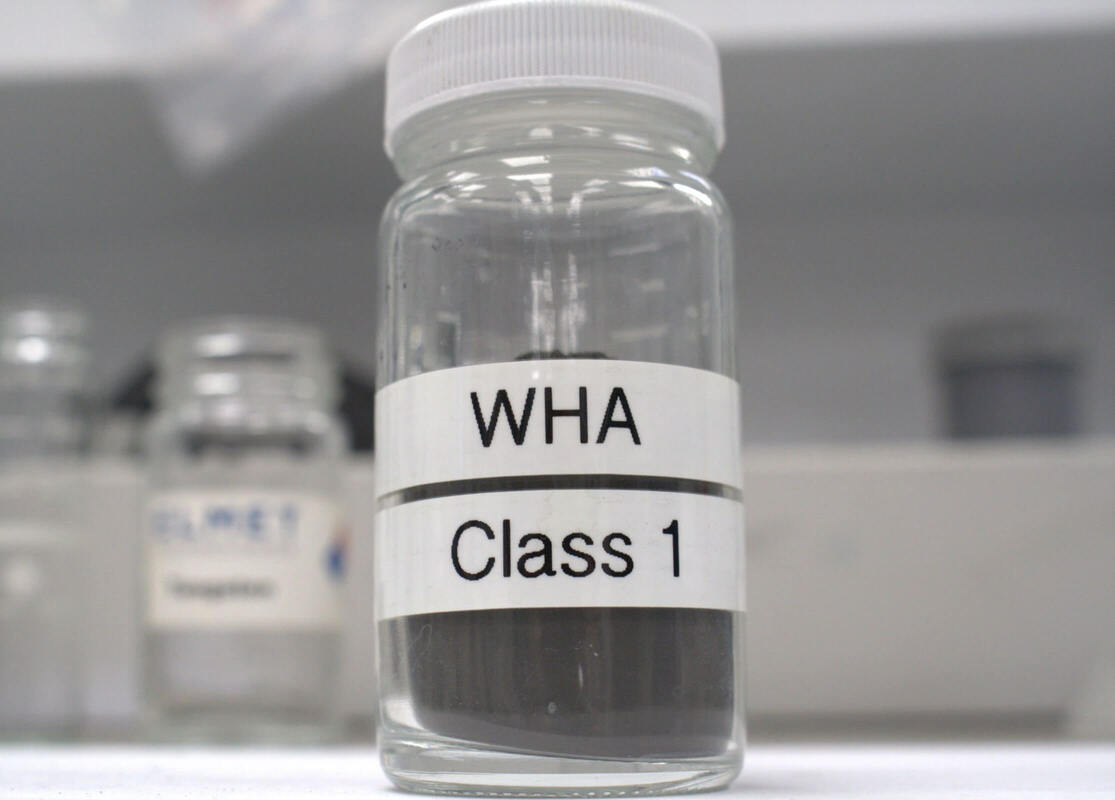 Glass jar with WHA Class 1 label